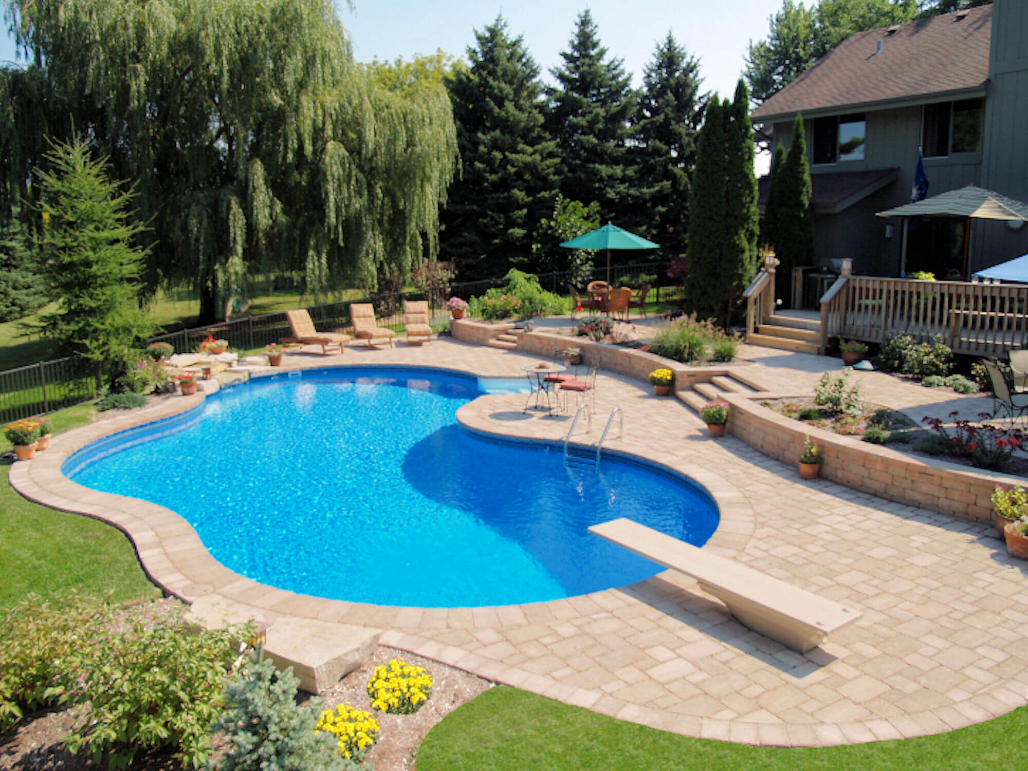 transitions from deck to patio to pool! (67) Arvidson Pools